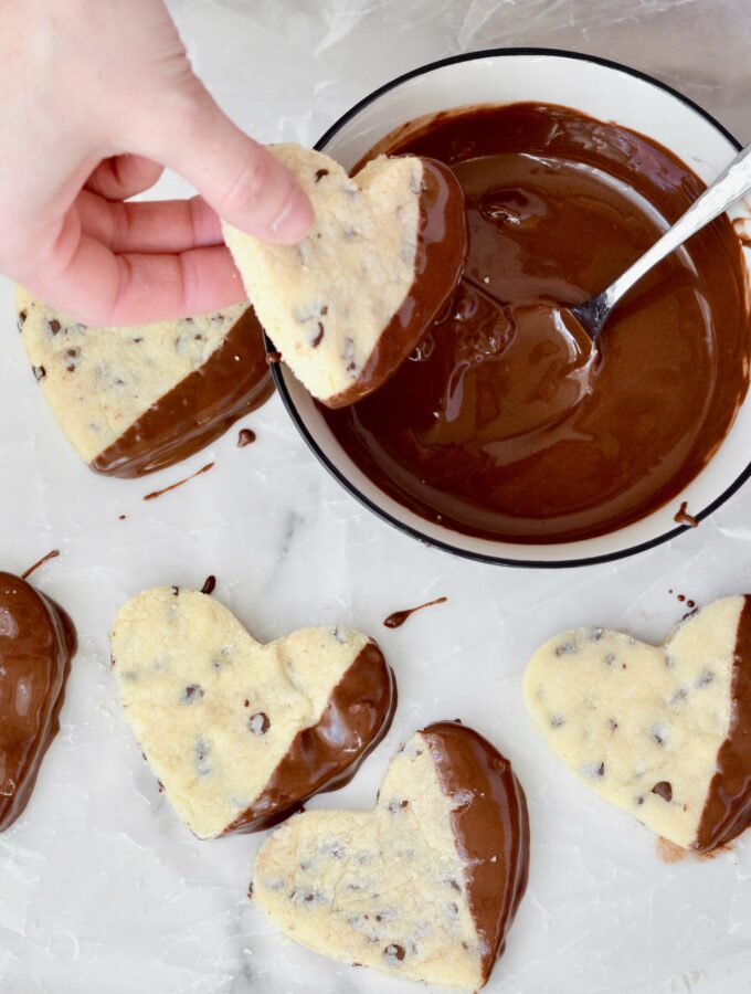 Butter Cookies with Mini Chocolate Chips - Simple recipe comes together in minutes. Cut into hearts and dip in chocolate for Valentine's Day. So cute and delicious! Makes a great teachers gift too!