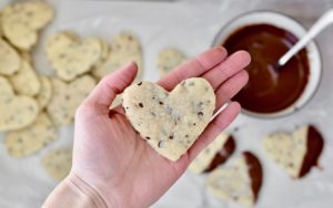 Butter Cookies with Mini Chocolate Chips - Simple recipe comes together in minutes. Cut into hearts and dip in chocolate for Valentine's Day. So cute and delicious! Makes a great teachers gift too!