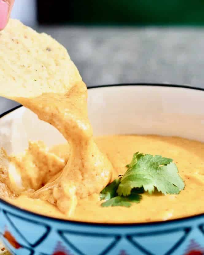 Easy Queso Dip ready in minutes! Amazing flavor goes great with nachos, topping for enchiladas or any dish!