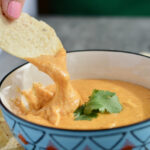 Queso cheese dip perfect for chips, bread or nachos. Make it as mild or spicy as you want. Cheesy and Easy.