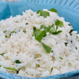 Cilantro Lime Rice made with Coconut Milk. Creamy and light rice perfect to go with any meal!