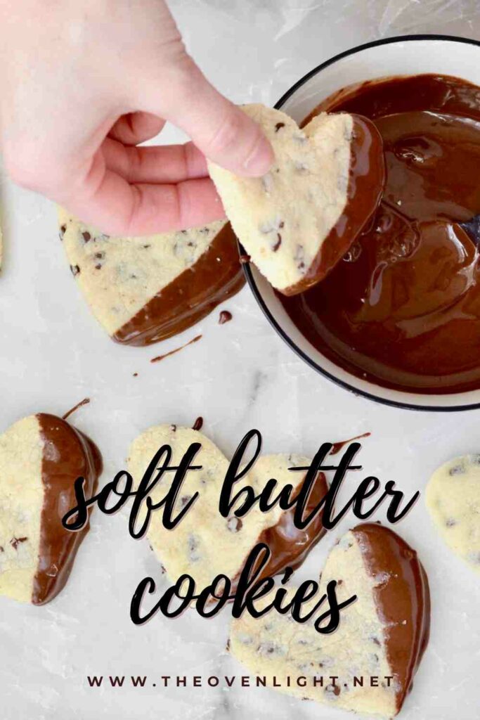 Soft Butter Cookies with Mini Chocolate Chips - Simple recipe comes together in minutes. Cut into hearts and dip in chocolate for Valentine's Day. So cute and delicious! Makes a great teacher or neighbor gift too! #buttercookie #cookierecipe #easycookies