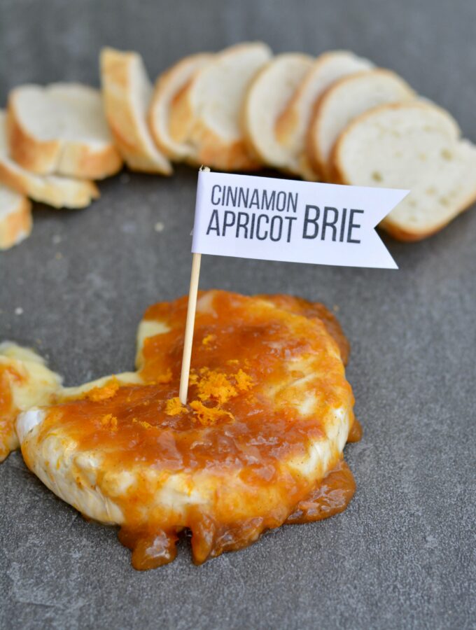 Apricot cinnamon brie cheese appetizer - crowd pleaser and super quick to prep! Creamy and sweet with a little tang, this is everyone's favorite appetizer!