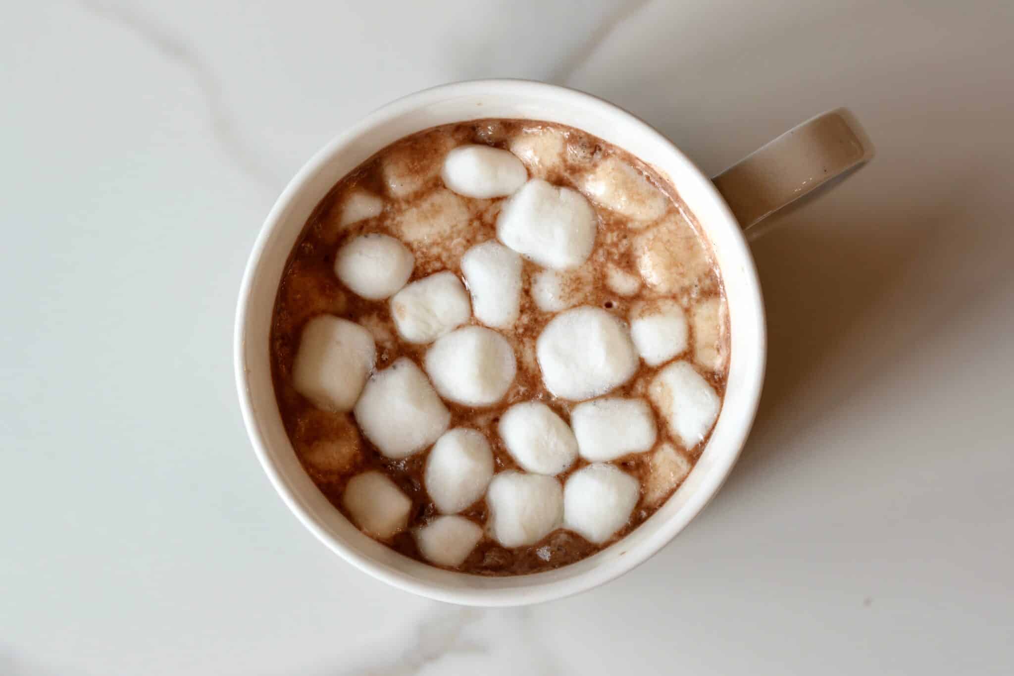 Hygge Hot Chocolate made with almond coconut milk. Curl up and keep warm with Hygge cocoa.