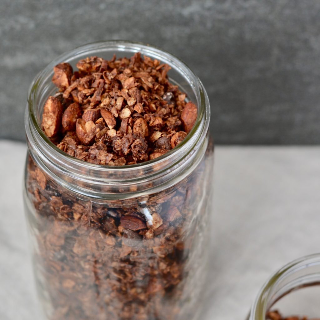 Chocolate Granola with almond, coconut and oats. Lightly sweetened with maple syrup. Perfect on top of raspberry yogurt!