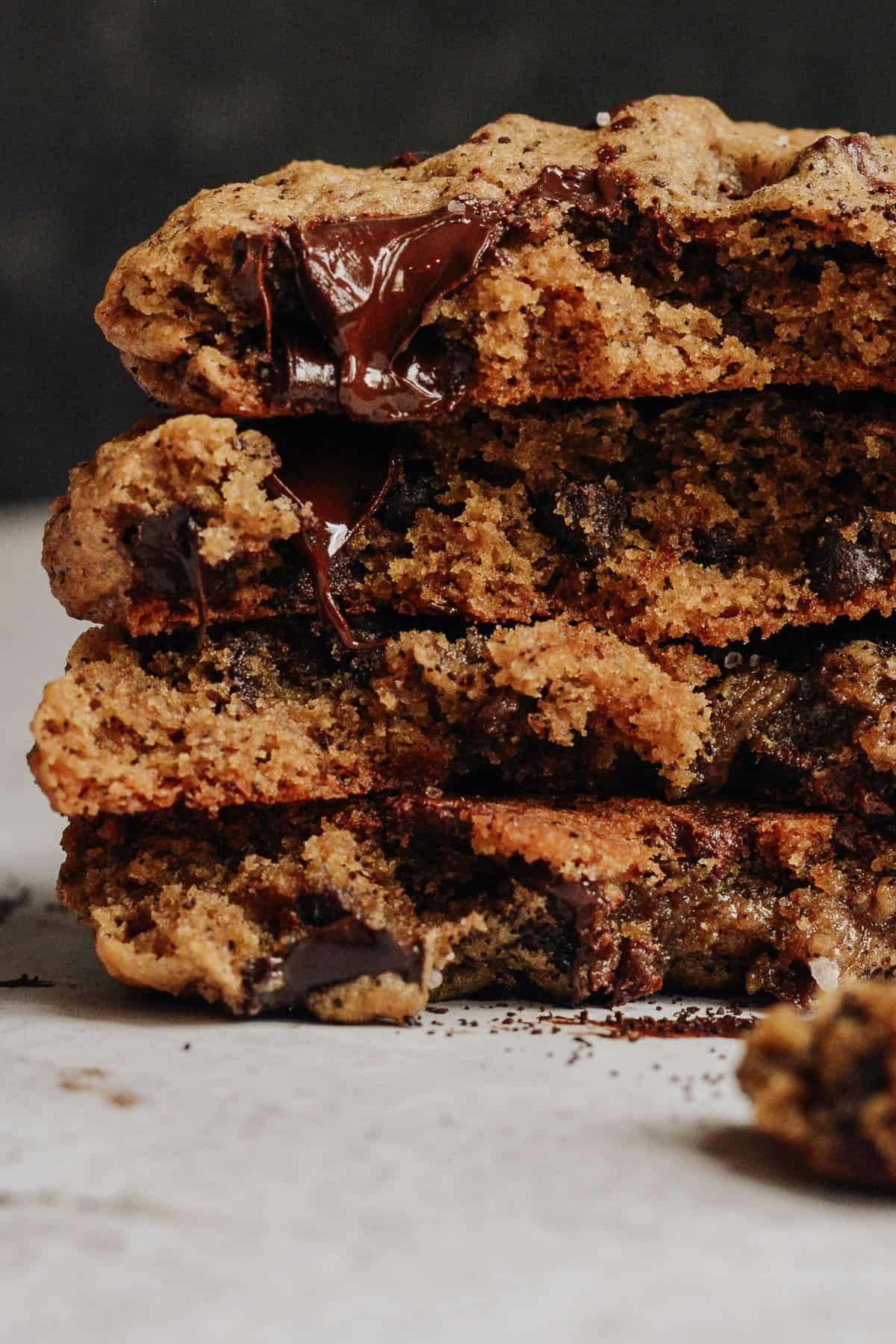 Up close of espresso cookie centers stacked on top of each other.