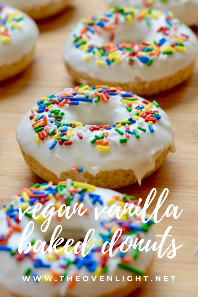 Vegan Vanilla Baked Donuts - simple recipe using warmed vanilla frosting in a can. So easy and so delicious! #vegan #donuts #bakednotfried