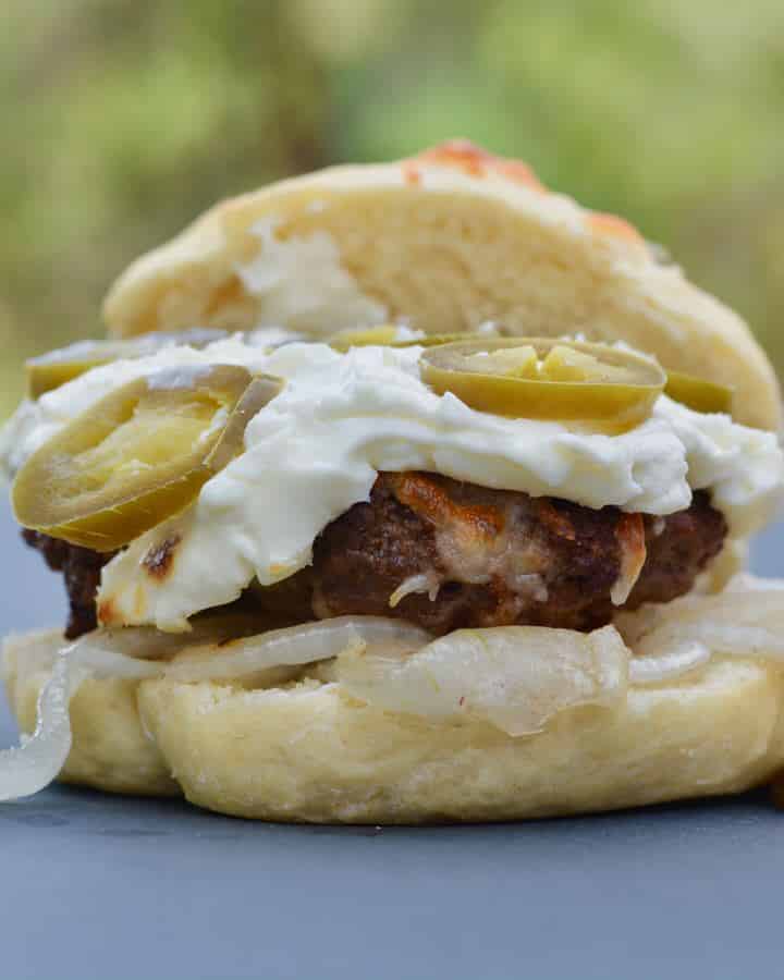 Jalapenño Popper Hamburger - cream cheese, mozzarella, onions and jalapeños. So easy and seriously so delicious! I've never had a burger so simple taste so amazing!