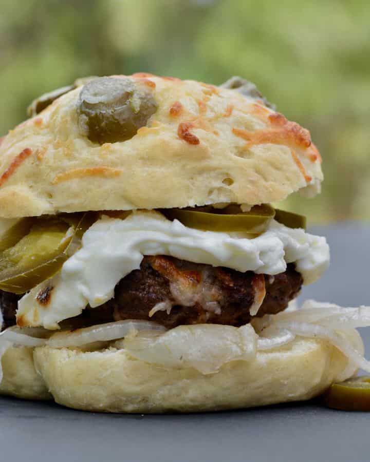 Jalapenño Popper Hamburger - cream cheese, mozzarella, onions and jalapeños. So easy and seriously so delicious! I've never had a burger so simple taste so amazing!