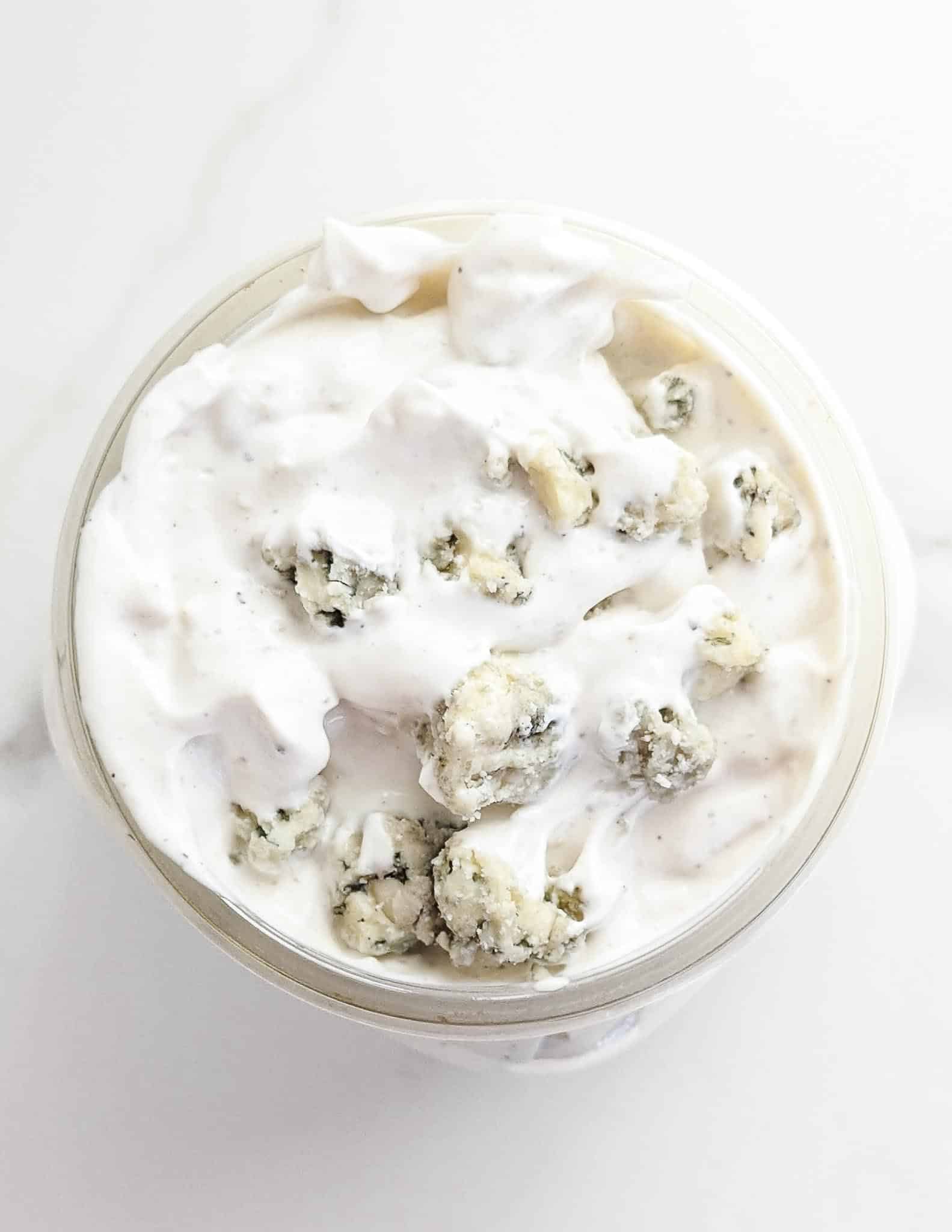 The BEST homemade Blue Cheese Dressing and Dip. A secret ingredient sets it apart from the rest and takes this blue cheese dressing to a whole other level! Perfect for dipping chips, fries, or on top of salad.