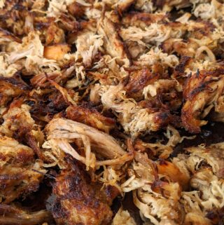 Carnitas made so full of flavor and so simple to make in a slow cooker or crock pot. Coca cola, orange juice, onion and spices flavor our pork shoulder or butt. YUM!