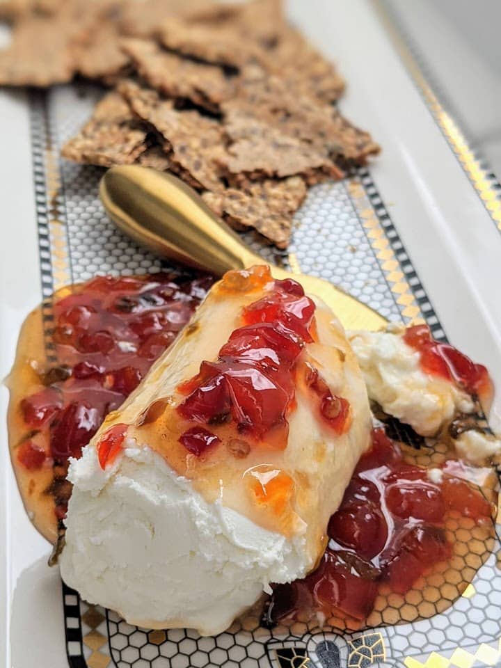Goat Cheese and Red Pepper Jelly Appetizer | only 2 ingredients. The perfect party appetizer. Sweet, spicy and tart, the perfect combination!