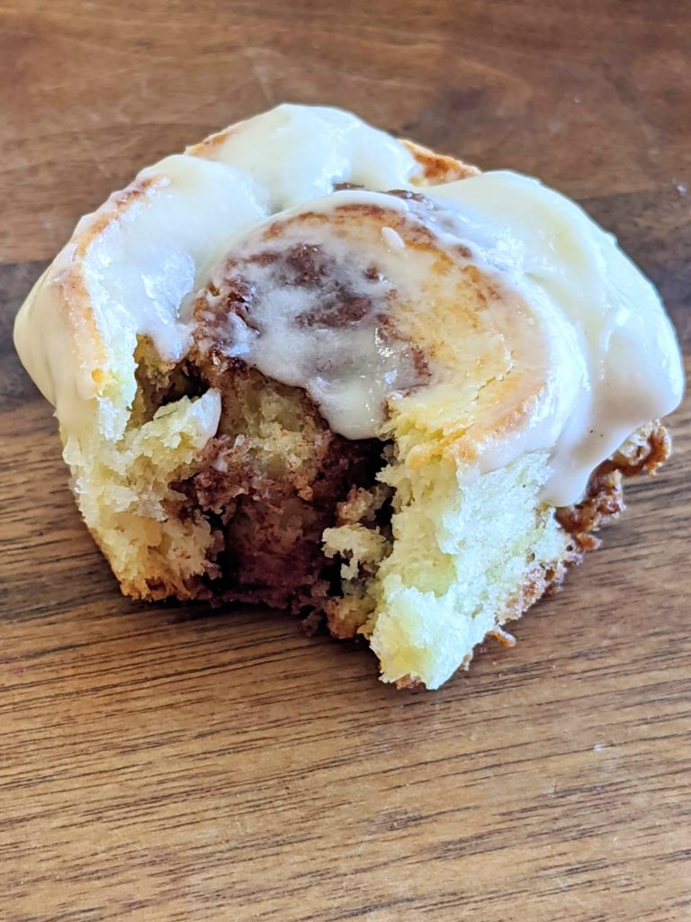 Mini Biscuit Cinnamon Rolls | Super quick recipe with no rise time. Perfectly flaky, full of cinnamon and sugar and covered in icing perfection!