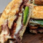 Jalapeño Blackberry Bacon Grilled Cheese | Mix up your grilled cheese night with this amazing flavor combination! Blackberry jam, jalapeño, bacon and your favorite cheese all on toasted sourdough bread. YUM!