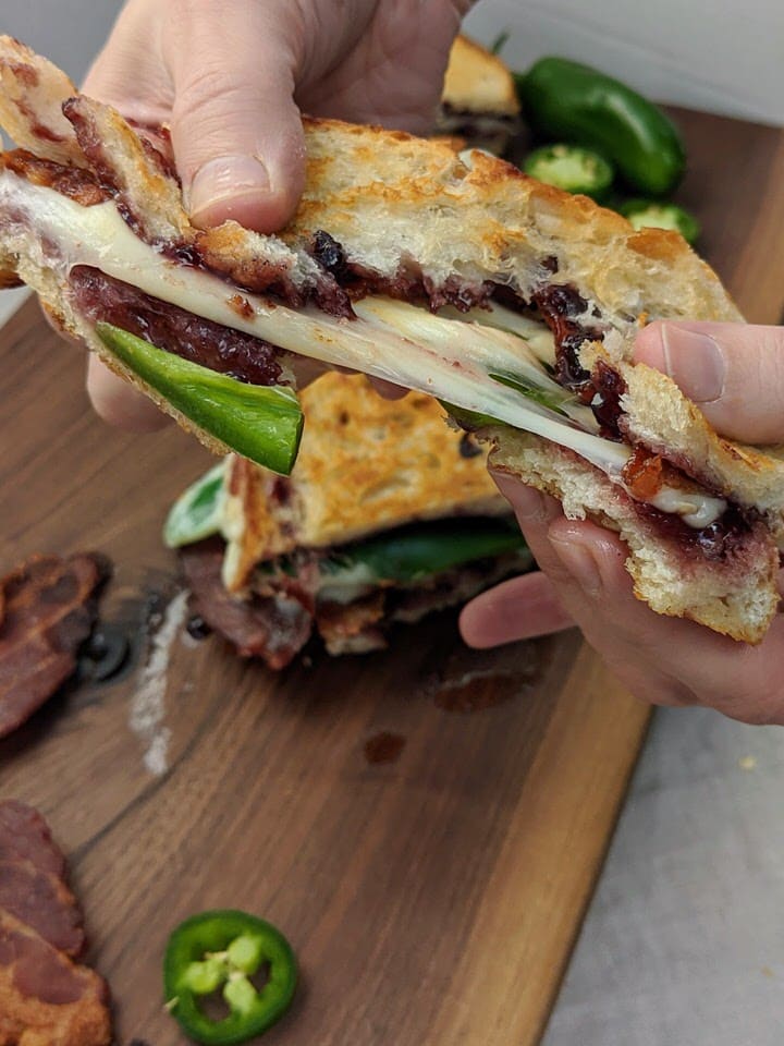 Jalapeño Blackberry Bacon Grilled Cheese | Mix up your grilled cheese night with this amazing flavor combination! Blackberry jam, jalapeño, bacon and your favorite cheese all on toasted sourdough bread. YUM!