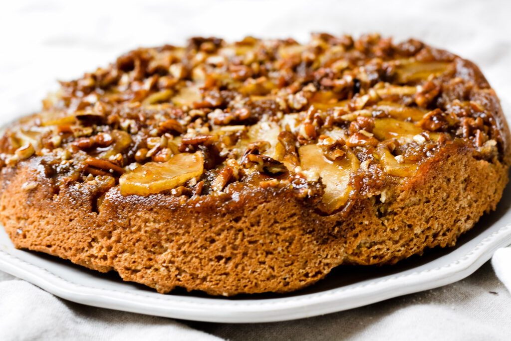 Upside Down Apple Cake | Warm, gooey, sugary topping with pecans, apples and brown sugar. Delicious dessert any time of the year!