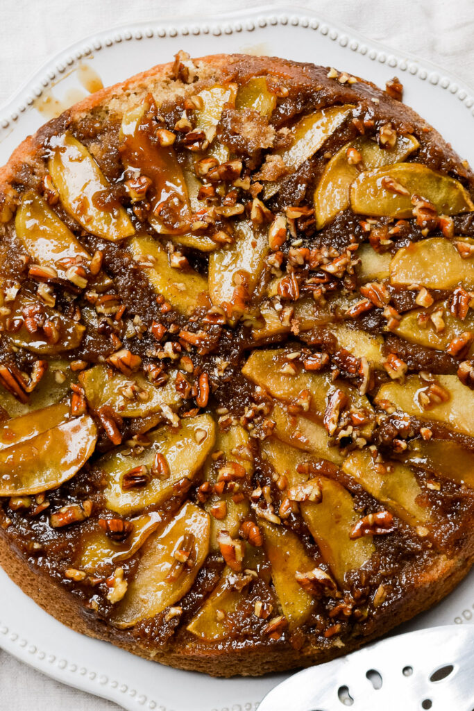 Upside Down Apple Cake | Warm, gooey, sugary topping with pecans, apples and brown sugar. Delicious dessert any time of the year!