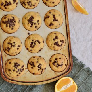 Orange Chocolate Chip Muffins | Gluten free & perfectly tender texture. Lots of orange flavor and plenty of mini chocolate chips make for a perfect breakfast treat!