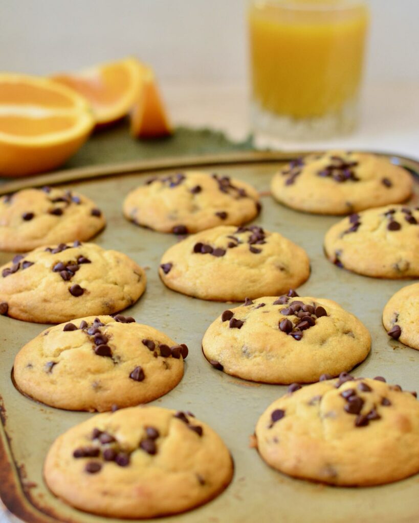 Orange Chocolate Chip Muffins | Gluten free & perfectly tender texture. Lots of orange flavor and plenty of mini chocolate chips make for a perfect breakfast treat!