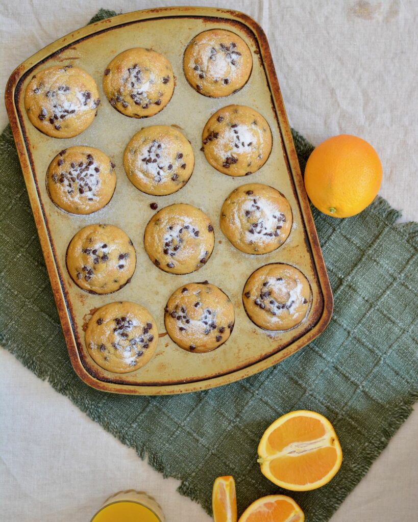 Orange Chocolate Chip Muffins | Gluten free & perfectly tender texture. Lots of orange flavor and plenty of mini chocolate chips make for a perfect breakfast treat!