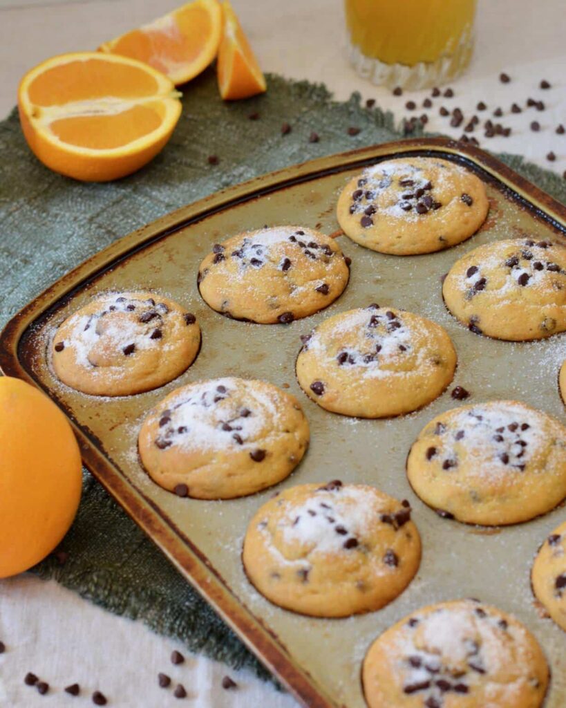 Orange Chocolate Chip Muffins | Gluten free & perfectly tender texture. Lots of orange flavor and plenty of mini chocolate chips make for a perfect breakfast treat!