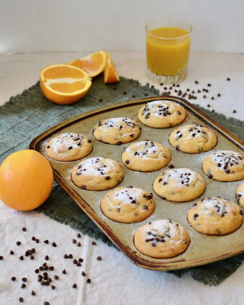 Orange Chocolate Chip Muffins | Gluten free & perfectly tender texture. Lots of orange flavor and plenty of mini chocolate chips make for a perfect breakfast treat!