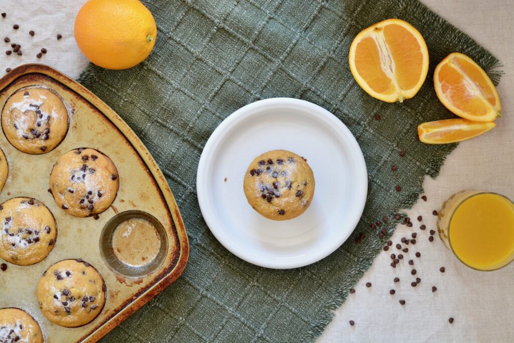 Orange Chocolate Chip Muffins | Gluten free & perfectly tender texture. Lots of orange flavor and plenty of mini chocolate chips make for a perfect breakfast treat!