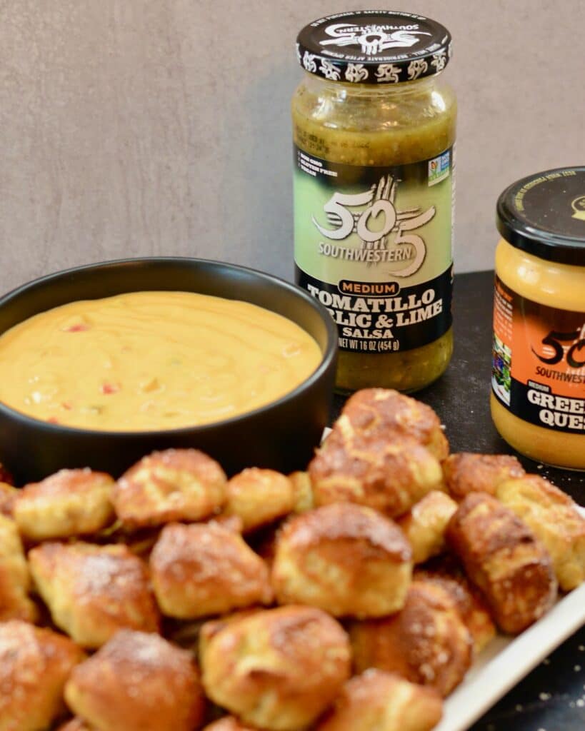 Pretzel Bites with a Kick! Adding fresh 505 Southwestern salsa right in the dough makes these pretzel bites really special. Dip in queso for the ultimate snack. #505southwestern #salsa #pretzels