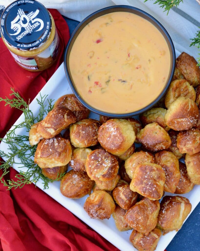 Pretzel Bites with a Kick! Adding fresh 505 Southwestern salsa right in the dough makes these pretzel bites really special. Dip in queso for the ultimate snack. #505southwestern #salsa #pretzels