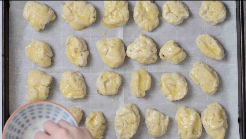 Step 11 - Pretzel Bites with a Kick! Adding fresh 505 Southwestern salsa right in the dough makes these pretzel bites really special. Dip in queso for the ultimate snack. #505southwestern #salsa #pretzels