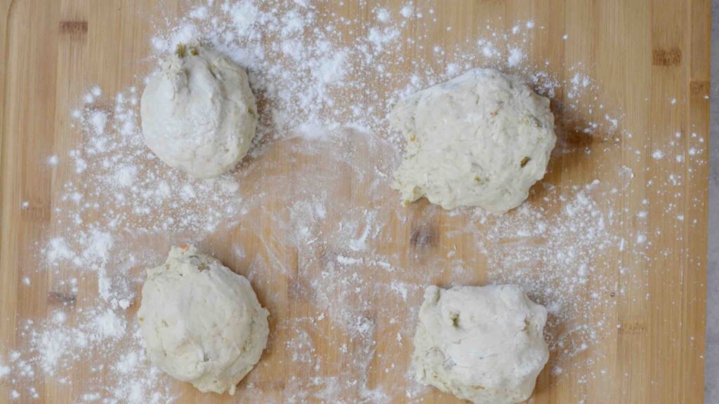 Step 6 - Pretzel Bites with a Kick! Adding fresh 505 Southwestern salsa right in the dough makes these pretzel bites really special. Dip in queso for the ultimate snack. #505southwestern #salsa #pretzels