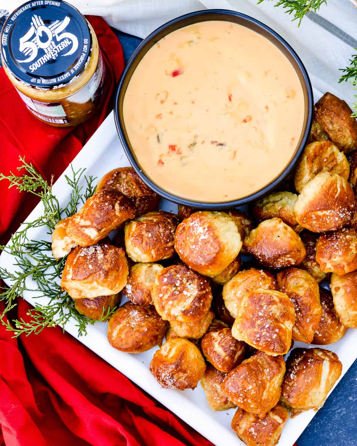 Pretzel bites with red and queso.