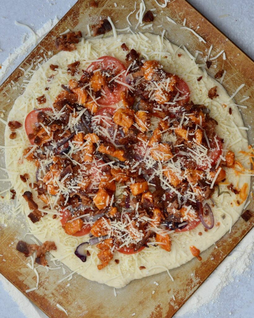 Amazing Buffalo Chicken Pizza | Made with our super popular no-rise time pizza dough and topped with a perfect combination of toppings. Simple weeknight meal comes together in minutes.