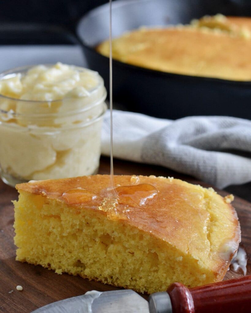 Delicious homemade Cornbread | Super simple recipe comes together in minutes. SO much better than a box mix. Plus, easy honey butter recipe!