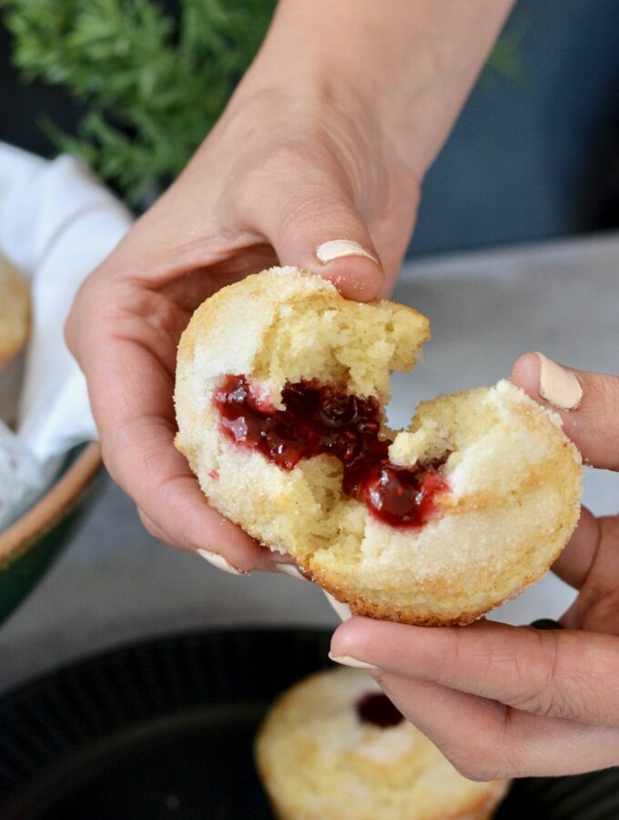 Sweet Donut Muffins made gluten free in this simple one bowl recipe. Why have just a muffin, when you can have a donut muffin? Filled with raspberry jam and relaxing moments. Perfect grab and go breakfast the whole family will treasure.