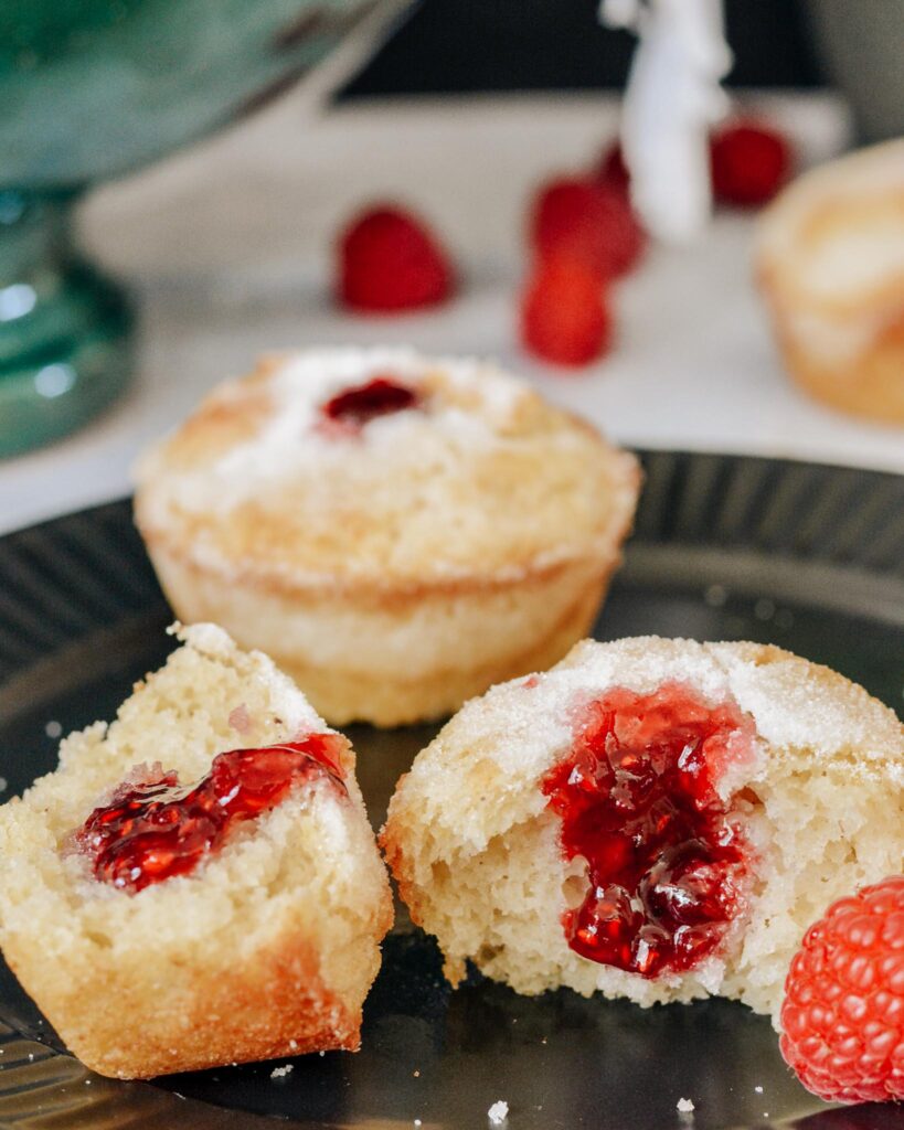 Sweet Buttermilk Muffins filled with raspberry preservesmade gluten free in this simple one bowl recipe. Why have just a muffin, when you can have a donut muffin? Filled with raspberry jam and relaxing moments. Perfect grab and go breakfast the whole family will treasure.