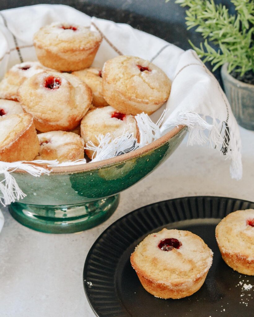 Sweet Buttermilk Muffins filled with raspberry preservesmade gluten free in this simple one bowl recipe. Why have just a muffin, when you can have a donut muffin? Filled with raspberry jam and relaxing moments. Perfect grab and go breakfast the whole family will treasure.