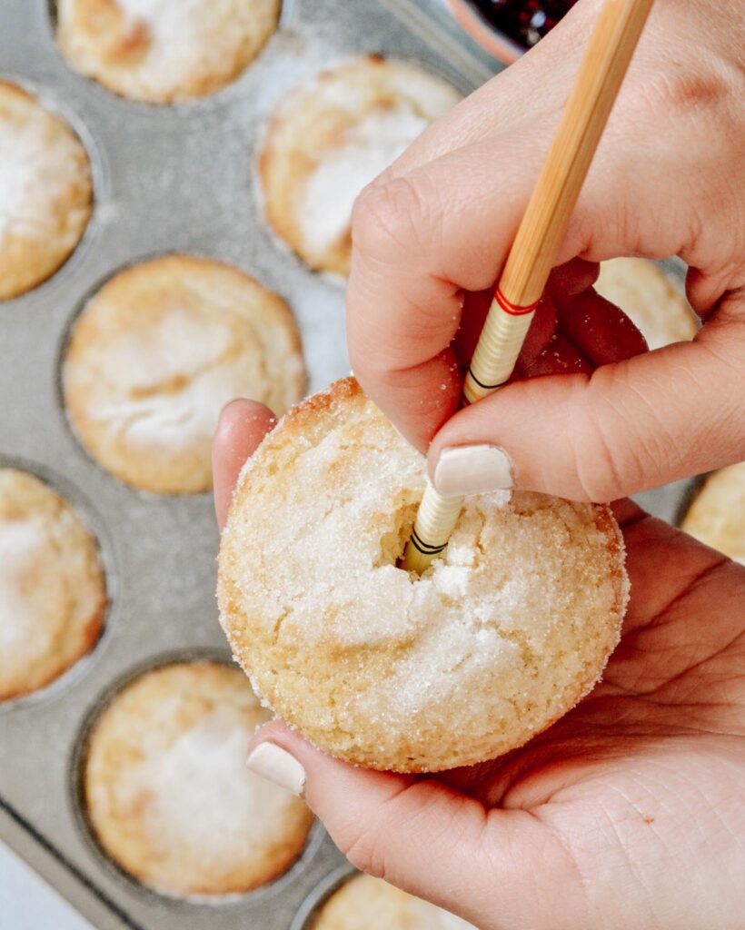 Sweet Buttermilk Muffins filled with raspberry preservesmade gluten free in this simple one bowl recipe. Why have just a muffin, when you can have a donut muffin? Filled with raspberry jam and relaxing moments. Perfect grab and go breakfast the whole family will treasure.