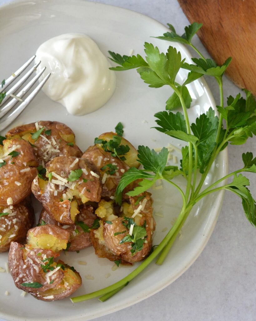 Crisp skin and tender inside, these smashed potatoes are bursting with flavor and are super simple to make. Goes great with just about ANY dinner.