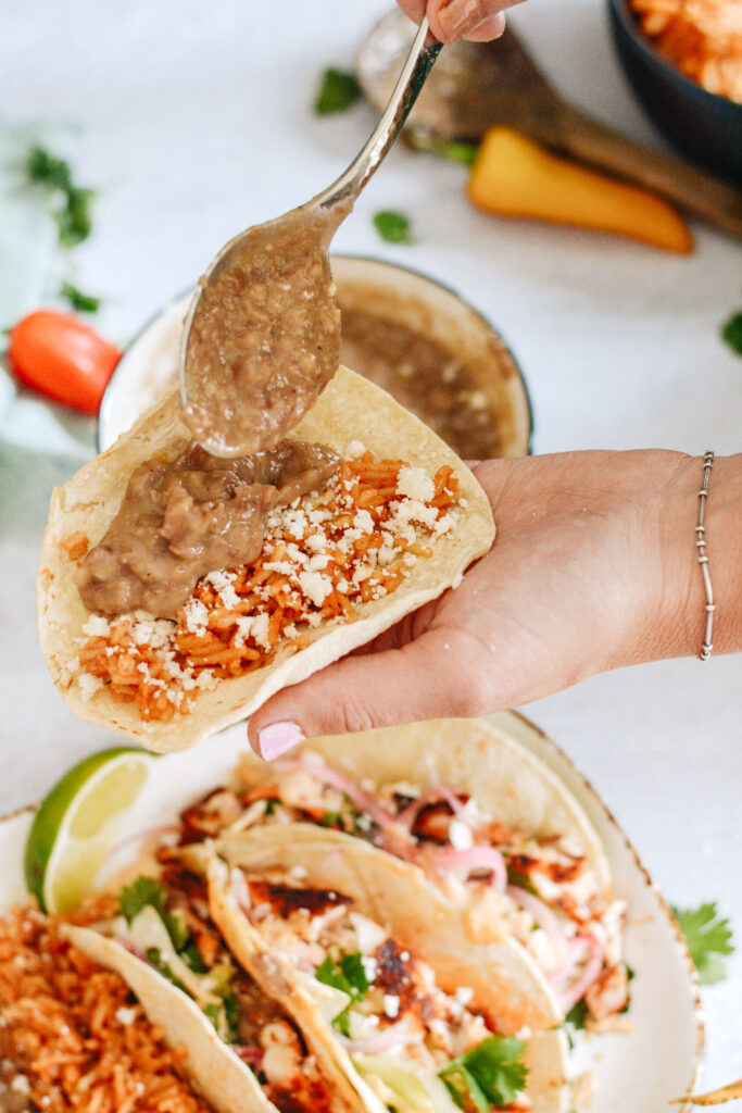 Restaurant style refried beans made in the Instant Pot. Totally easy and way better than the stuff out of the can!