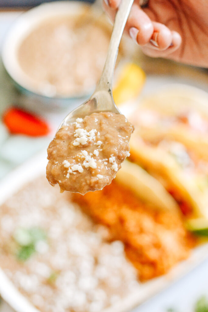 Restaurant style refried beans made in the Instant Pot. Totally easy and way better than the stuff out of the can!