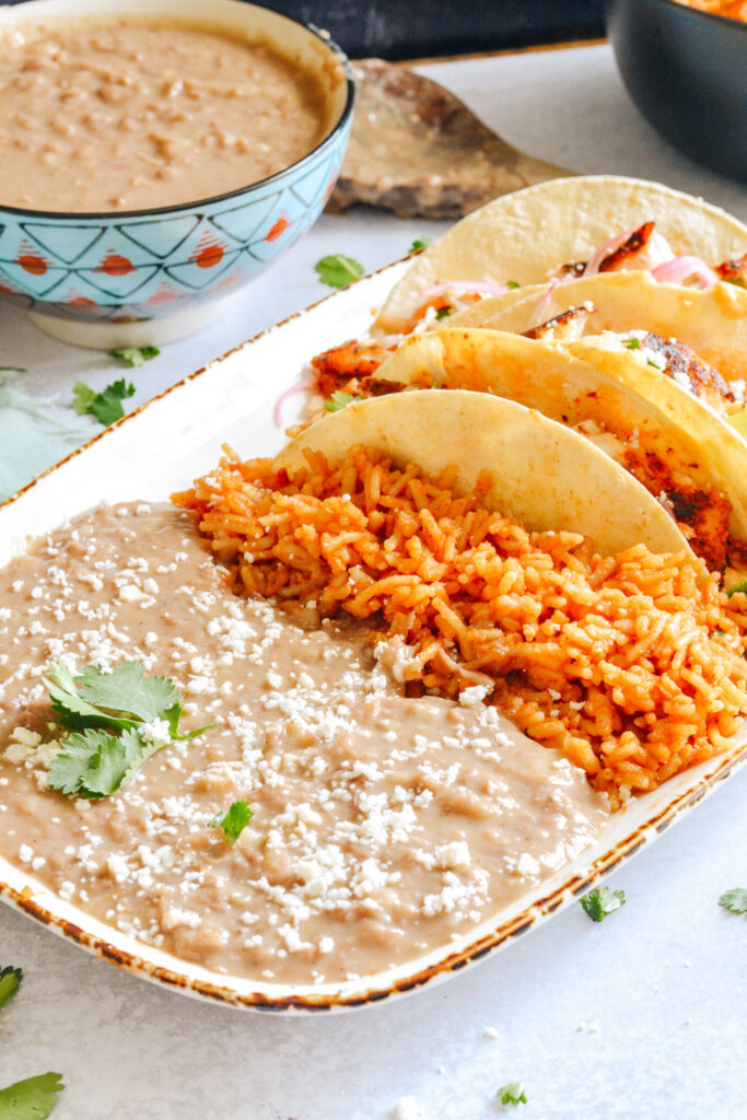 Restaurant style refried beans made in the Instant Pot. Totally easy and way better than the stuff out of the can!