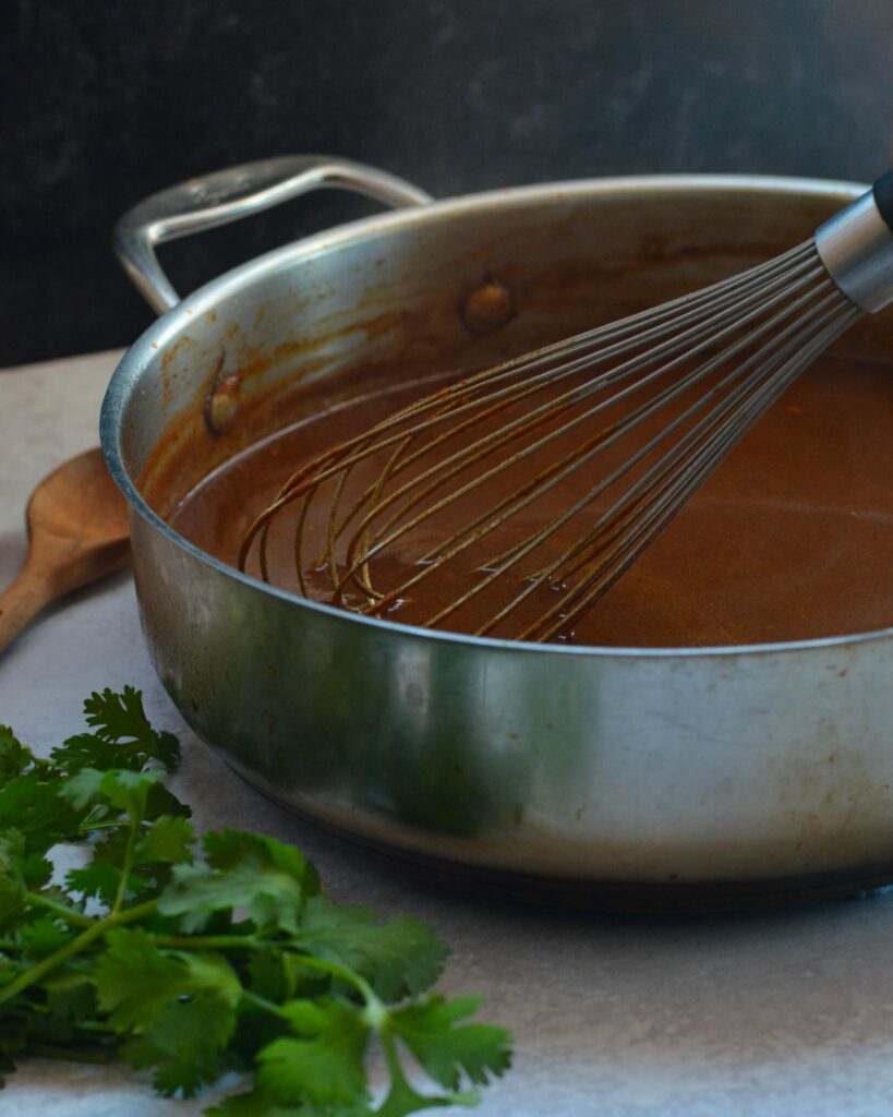 Incredibly easy enchilada sauce - just a handful of ingredients, 10 minutes and one pan. Amazing flavor, so much better than canned.