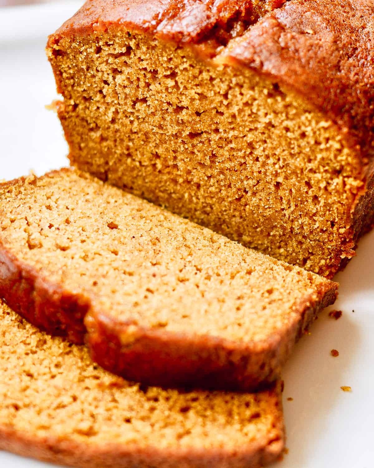 Loaf of sliced pumpkin bread.