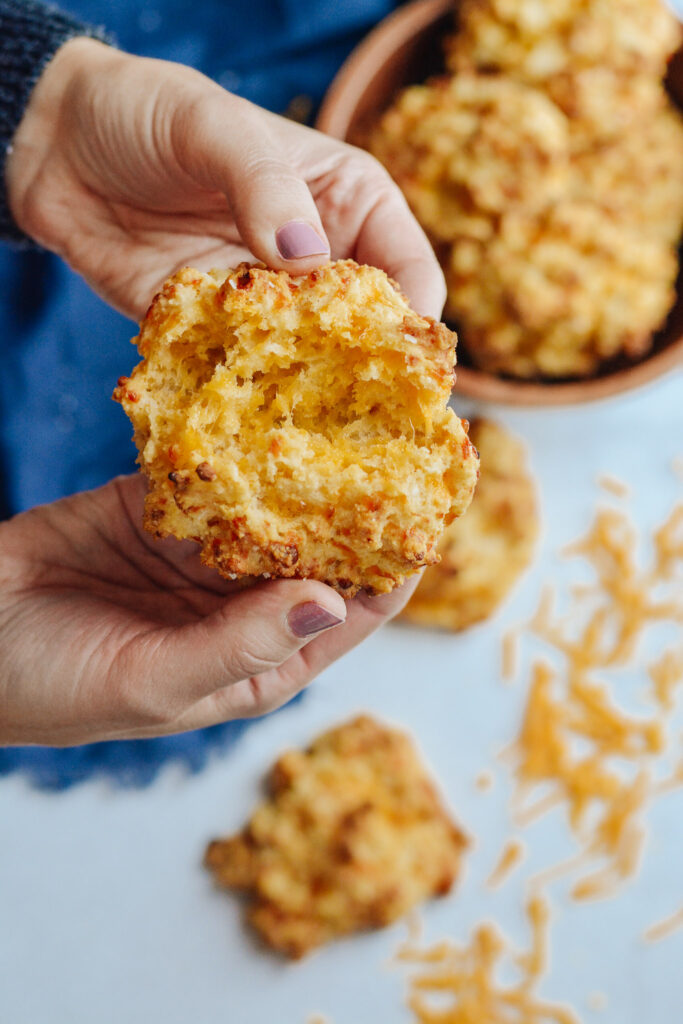 Cheddar Drop Biscuits absolutely loaded with cheese and flavor. Perfect companion to your favorite soup or alongside your BBQ. #biscuits #cheddarbiscuit #glutenfree