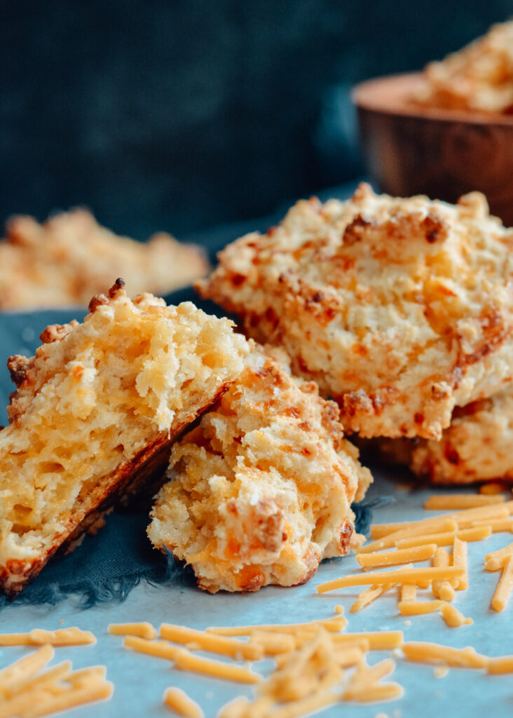 Cheddar Drop Biscuits absolutely loaded with cheese and flavor. Perfect companion to your favorite soup or alongside your BBQ. #biscuits #cheddarbiscuit #glutenfree