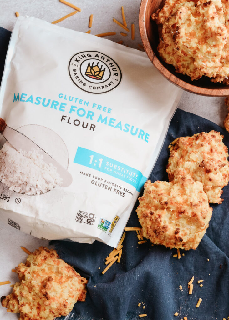 Cheddar Drop Biscuits absolutely loaded with cheese and flavor. Perfect companion to your favorite soup or alongside your BBQ. #biscuits #cheddarbiscuit #glutenfree