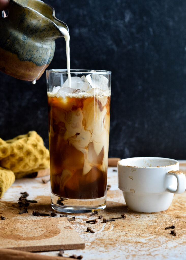 Dirty Iced Chai Drink made with only 3 ingredients. Completely delicious and easy to make regular or decaf. Who knew coffee and tea could taste so amazing together?!