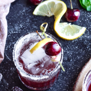 Black Cherry Whiskey Sour | Amazing cocktail with simple ingredients. Sparkling water, black cherry juice, whiskey and sweetener. Drink up!