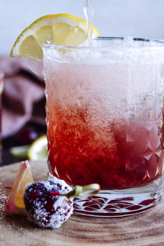 Black Cherry Whiskey Sour | Amazing cocktail with simple ingredients. Sparkling water, black cherry juice, whiskey and sweetener. Drink up!